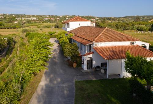 an overhead view of a house with a driveway at Ilias Apartments in Methoni