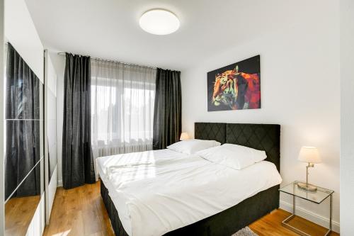 Ένα ή περισσότερα κρεβάτια σε δωμάτιο στο George Apartment