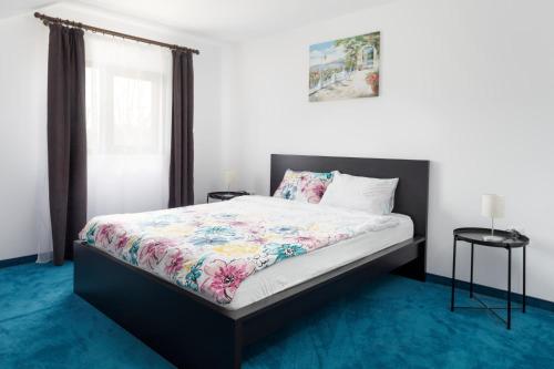 Postel nebo postele na pokoji v ubytování Transylvanian House
