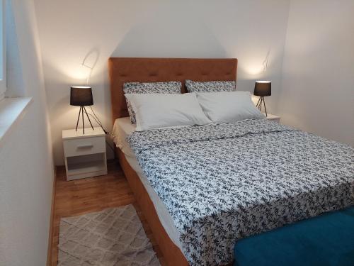 Posteľ alebo postele v izbe v ubytovaní Sunrise apartment