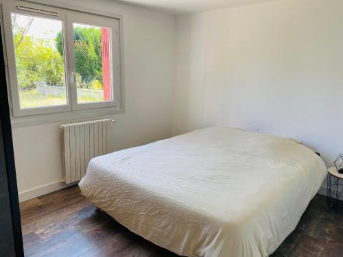 Postel nebo postele na pokoji v ubytování Appartement T3 indépendant, calme à Ustaritz