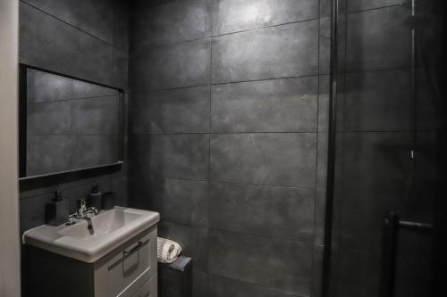 Koupelna v ubytování Appart'Hôtel Le Bright Evry- 4 Chambres Design