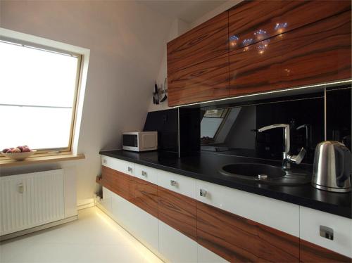 Kuchyňa alebo kuchynka v ubytovaní Apartament przy Krupówkach