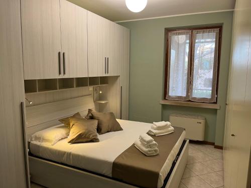 Posteľ alebo postele v izbe v ubytovaní Green Apartment and Pools