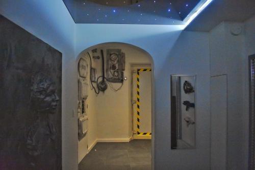 a hallway with a ceiling with stars on it at -GALAXY SPA-JACUZZI-INSOLITE-4PERS-Jardin-SPA-CLIM in Holtzwihr