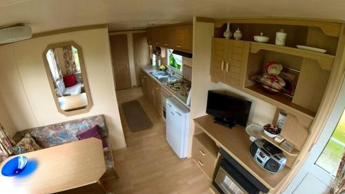 an aerial view of a small kitchen with a caravan at DEVIL'S BIT accommodation in Killea