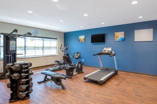 a gym with several exercise equipment in a room at Comfort Suites St George - University Area in St. George