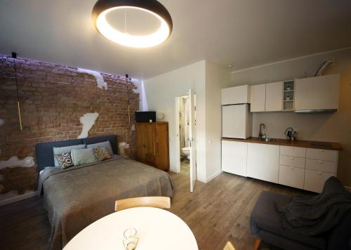 Ett kök eller pentry på Comfortable design apartment on Vilanu