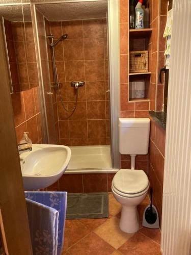 Ванная комната в Kleines Haus am Waldrand