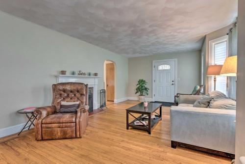 a living room with a couch and a chair at Cozy Middletown Home Near Beaches and Newport! in Middletown