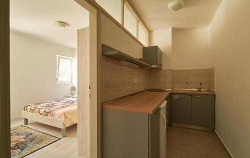 Kuchyň nebo kuchyňský kout v ubytování Cozy modern apartment Amphora-Beach near