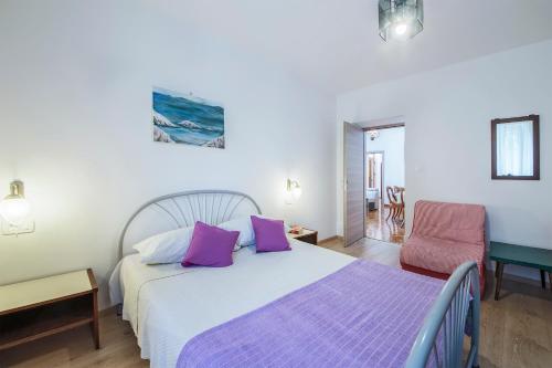 Postel nebo postele na pokoji v ubytování Villa Ana
