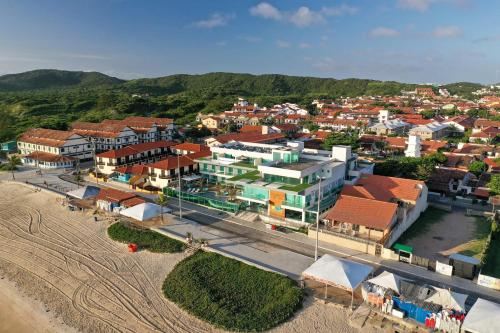 an aerial view of a city with a town at Paradiso Peró Praia Hotel in Cabo Frio