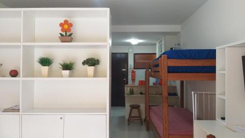 Postel nebo postele na pokoji v ubytování Winterville Flat 213