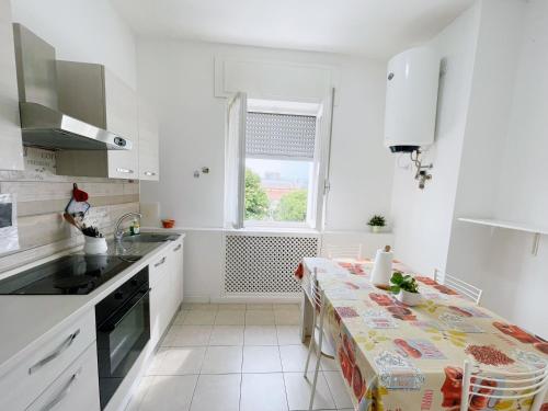 Kuchyň nebo kuchyňský kout v ubytování Confortini Rooms SUNDAY