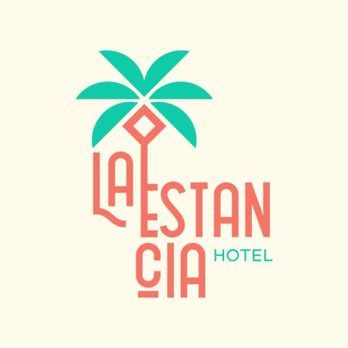 a sign for a hotel with a palm tree at La Estancia Hotel Ica in Ica