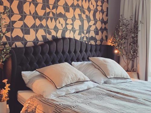 Postel nebo postele na pokoji v ubytování FeWo Prora - Designapartment Sir Henry