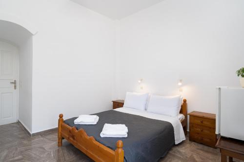 Ένα ή περισσότερα κρεβάτια σε δωμάτιο στο Porto Villa
