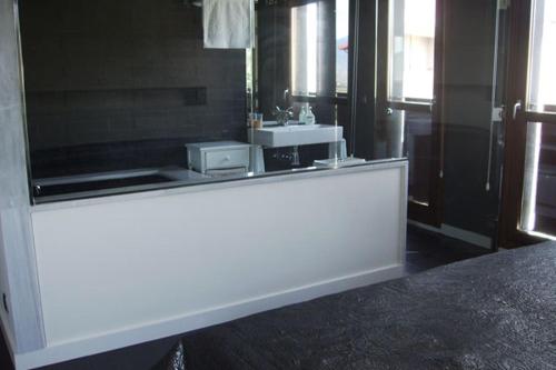 a white counter in a room with a sink at Casa Marisa in San Asensio