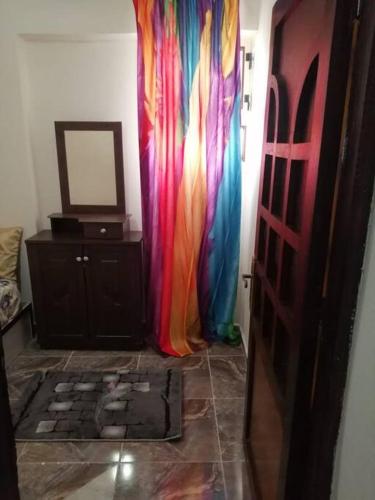 a hallway with a colorful curtain in a room at Sea spirit in Alexandria