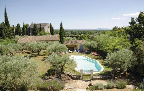 an overhead view of a swimming pool in a garden at Amazing Home In Caumont Sur Durance in Caumont-sur-Durance