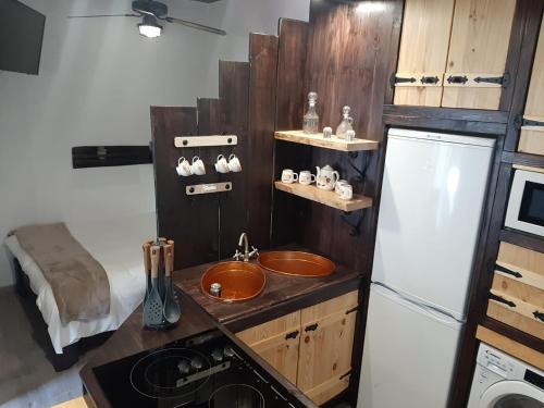 A kitchen or kitchenette at El Rinconcito