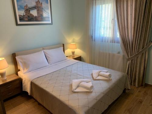 Ένα ή περισσότερα κρεβάτια σε δωμάτιο στο Holiday home in Nea Kallikratia