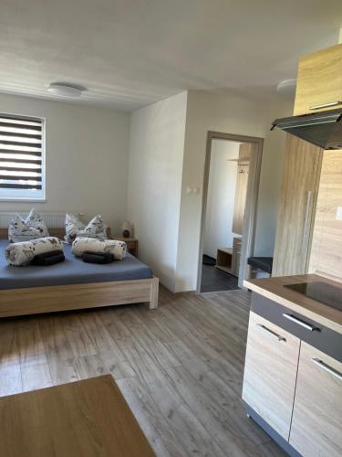 Postel nebo postele na pokoji v ubytování Apartmánový dom Magda