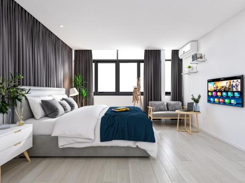 Postel nebo postele na pokoji v ubytování Xiamen 12 Seaside Hotel