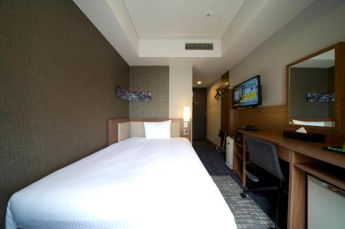 Телевизор и/или развлекательный центр в ibis Styles Tokyo Ginza