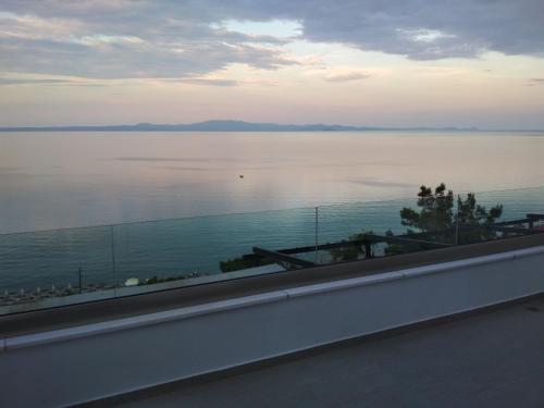 a view of the water from a balcony at Myrto 's sea view in Kallithea Halkidikis