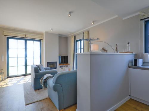 Foto dalla galleria di Reetland am Meer - Premium Reetdachvilla mit 3 Schlafzimmern, Sauna und Kamin F23 a Dranske
