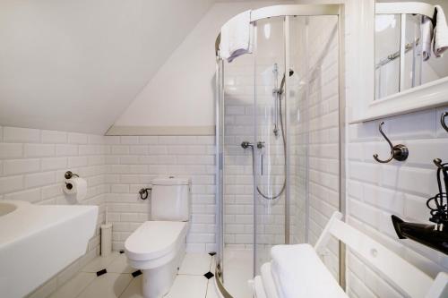 Kúpeľňa v ubytovaní Stare Sady Chillout Rooms "Pod Jabłoniami"