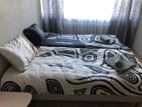 Postel nebo postele na pokoji v ubytování Pärnu,Papiniidu29-34
