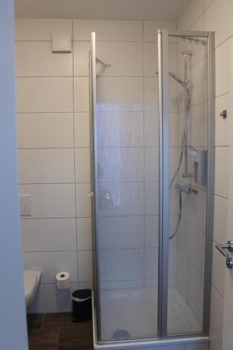 Ένα μπάνιο στο Tempel-inn Appartements Molkereistr. 2