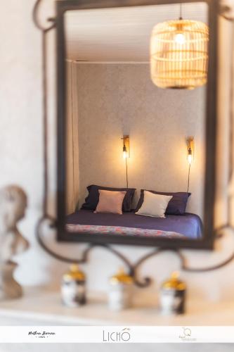 Ένα ή περισσότερα κρεβάτια σε δωμάτιο στο Le clos des Noaillettes