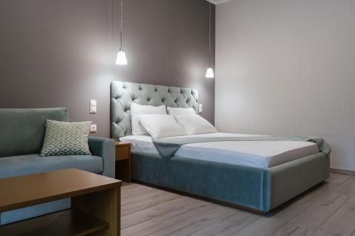 Ліжко або ліжка в номері Erietta Rooms