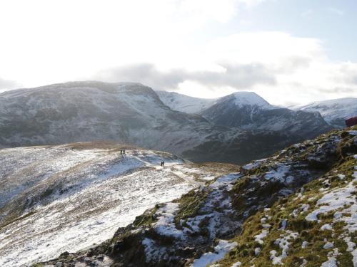 a group of people walking on a snow covered mountain at Swaledale Watch House Annexe in Wigton