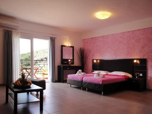 A bed or beds in a room at Dafni studios no2
