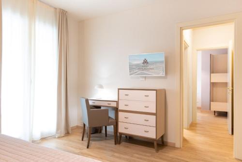 Ένα ή περισσότερα κρεβάτια σε δωμάτιο στο Hotel Atlantico