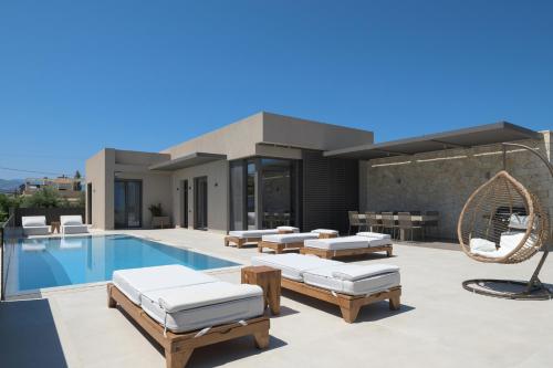 Athina Luxury Villa, with Pool & Walk to the Beach, By ThinkVilla