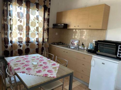 A kitchen or kitchenette at Xenia Apartments Keramoti (Studio 2)