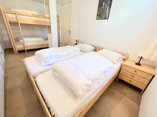 Postel nebo postele na pokoji v ubytování Appartement 4 couchages à proximité du plan d'eau