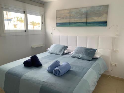 Ένα ή περισσότερα κρεβάτια σε δωμάτιο στο SEA&RELAX