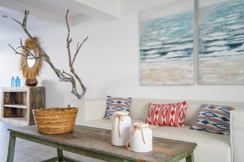 a living room with a couch and a table at INNER Hotel Rupit "Adults Only" in Cala d´Or