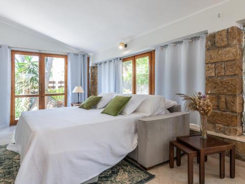 Postel nebo postele na pokoji v ubytování Villa Iole Apartment