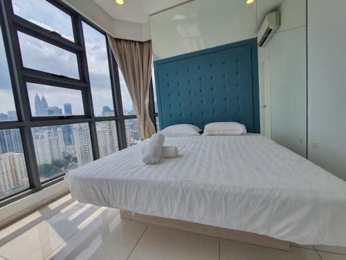 Un ou plusieurs lits dans un hébergement de l'établissement The Robertson Bukit Bintang by WEEGO Homes