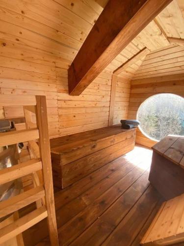 a wooden room with a bench in a cabin at Bel Air - Propriétés Mont Amour in Montriond