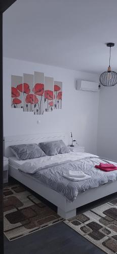 Postel nebo postele na pokoji v ubytování Apartman MELANI