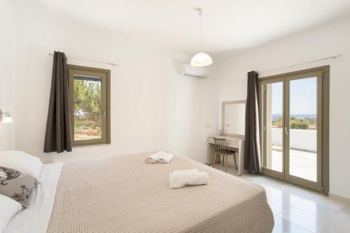 A bed or beds in a room at Hercules house pyrgaki paros
